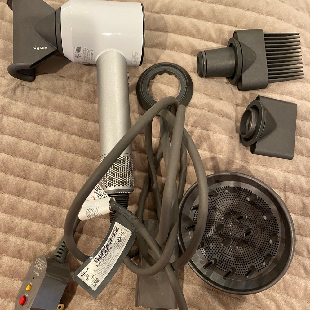 Dyson hairdryer. Great condition. All parts come with it. I do not have the box.